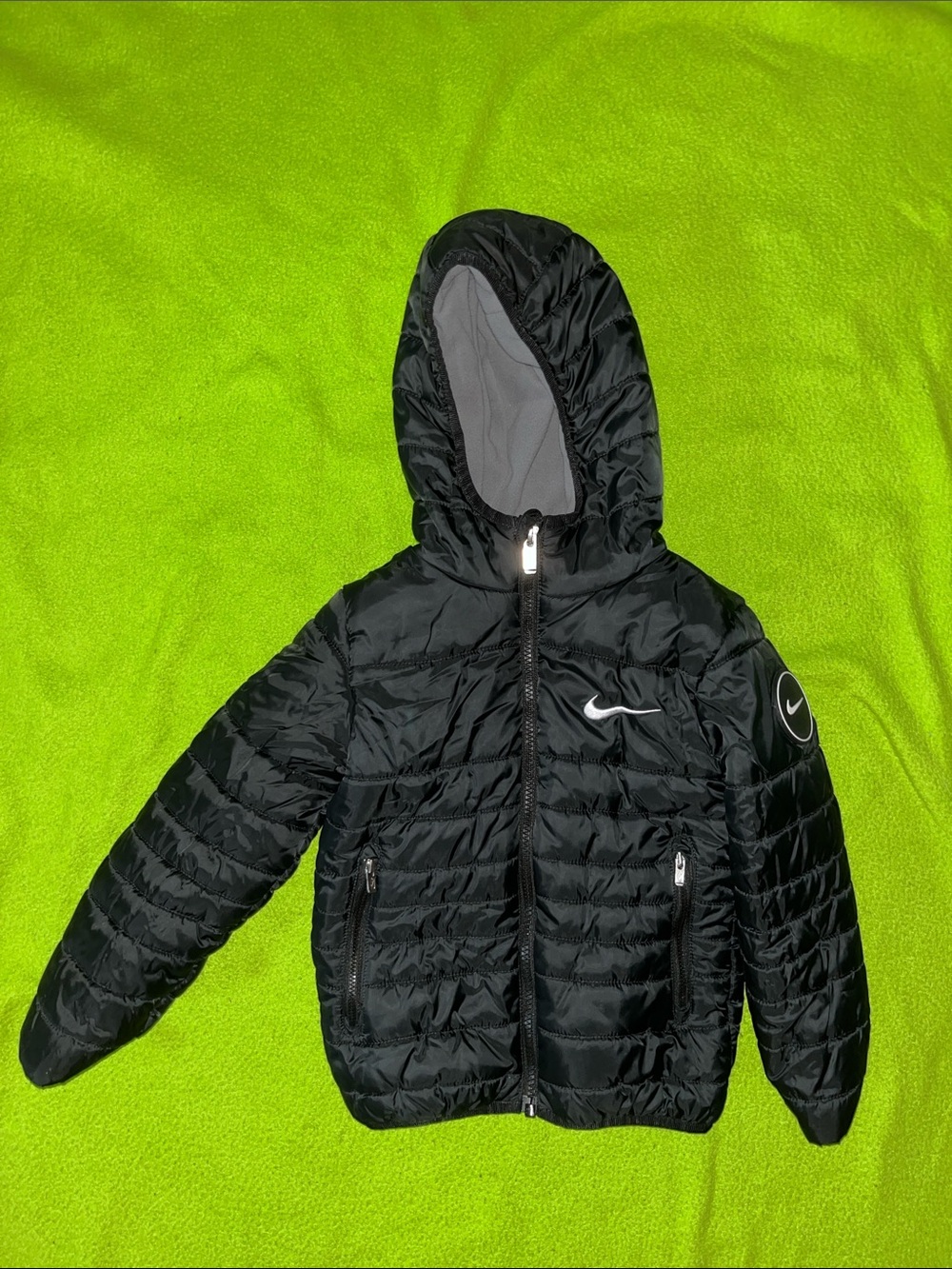 Nike Black Hooded Kids Puffer Jacket with White Swoosh